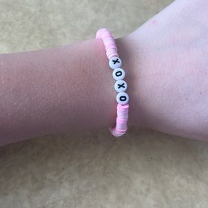 Pink xoxo handmaid clay bead bracelet